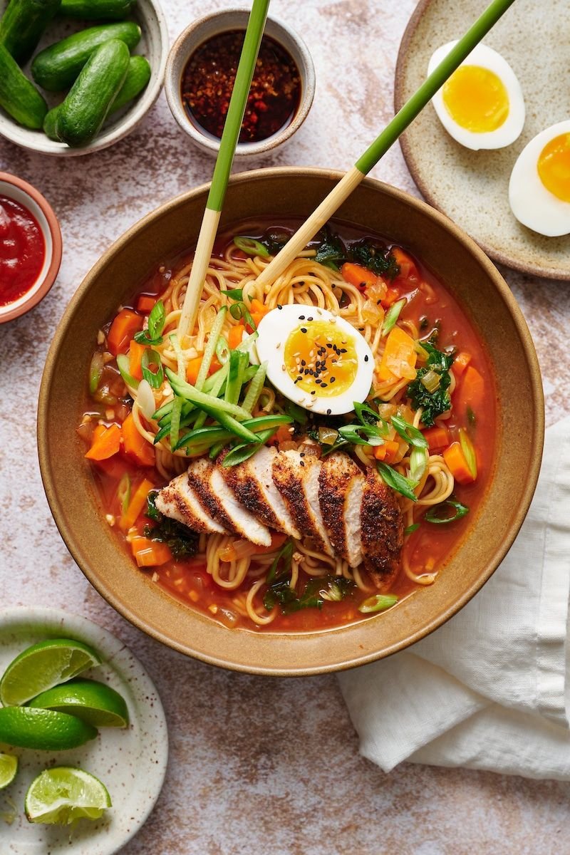 Fresh ramen bowl with noodles, vegetables and a soft-boiled egg